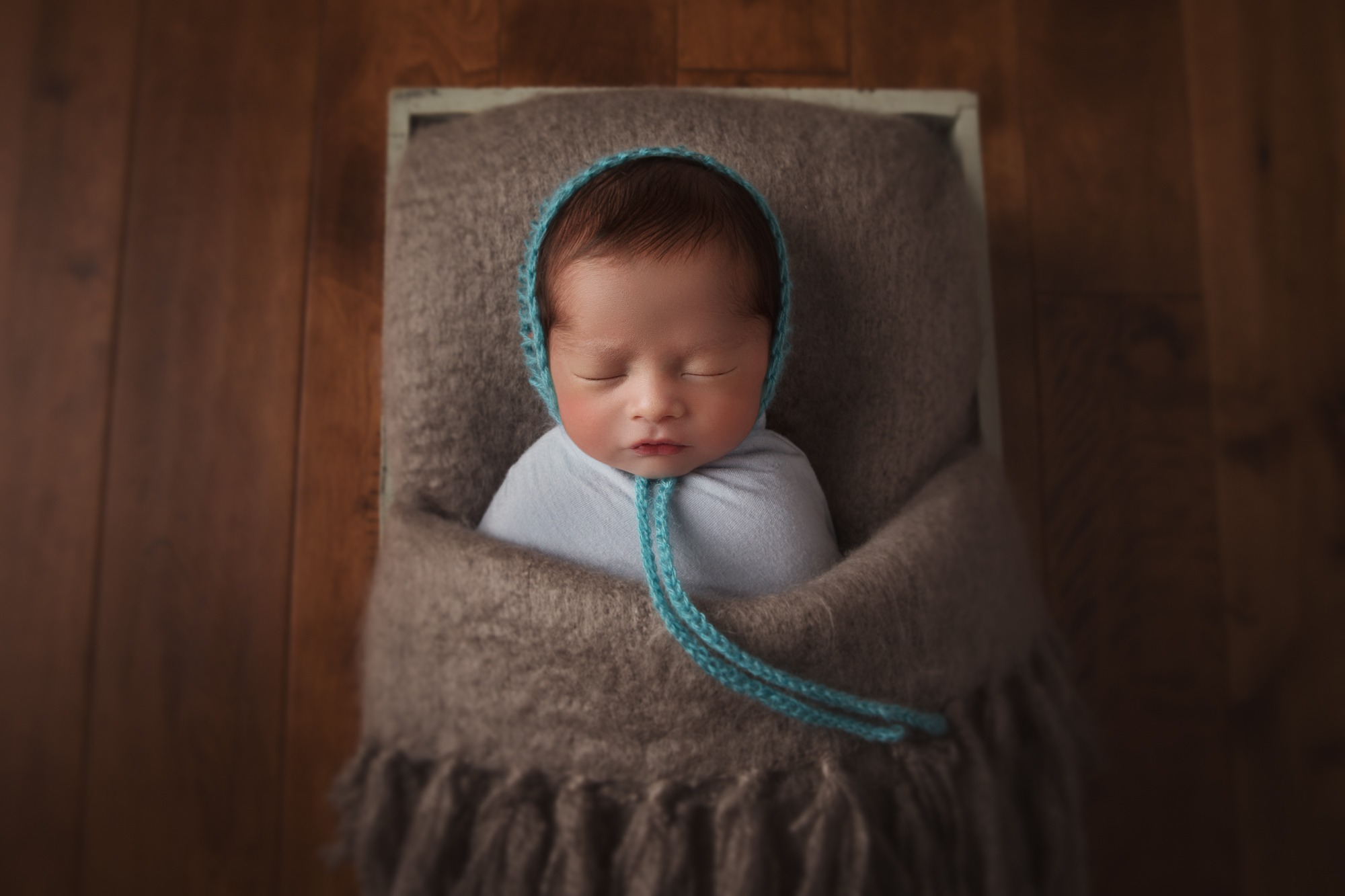 Newborn in crate